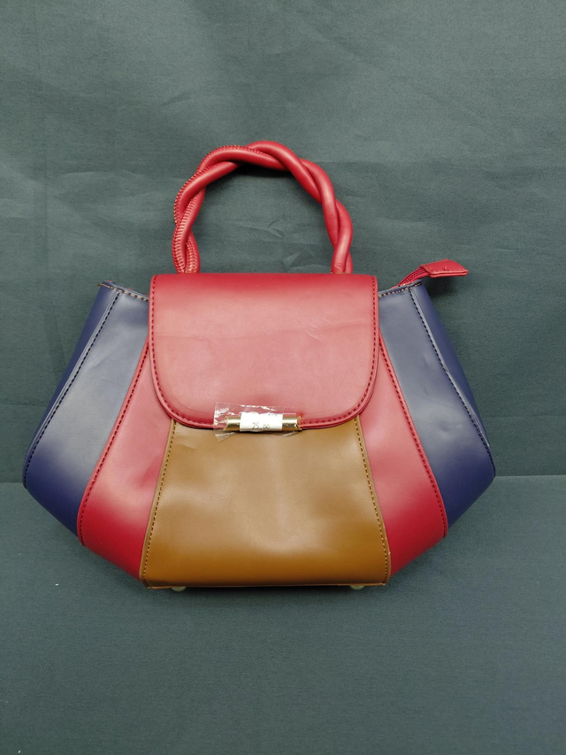 Petit sac en cuir couleur rouge/ brun/ bleu