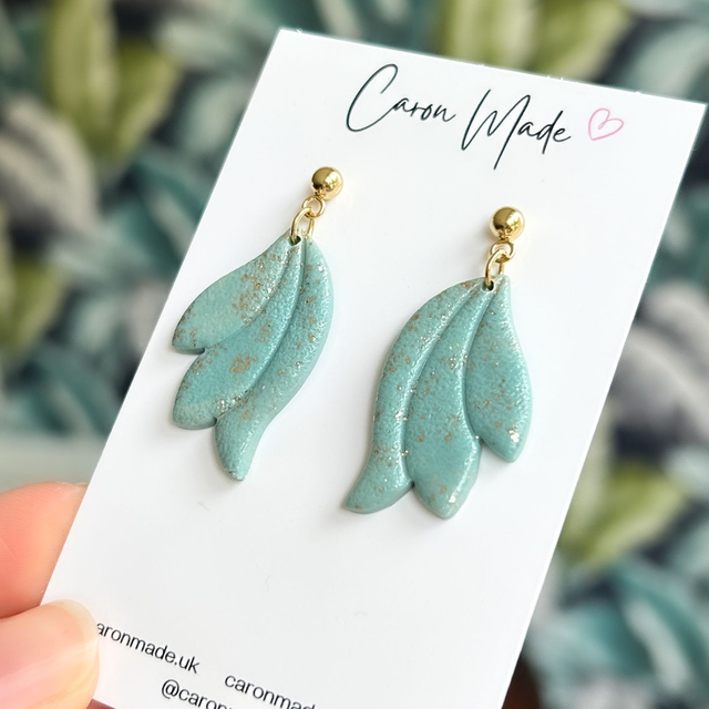 Green and gold floral shape earrings