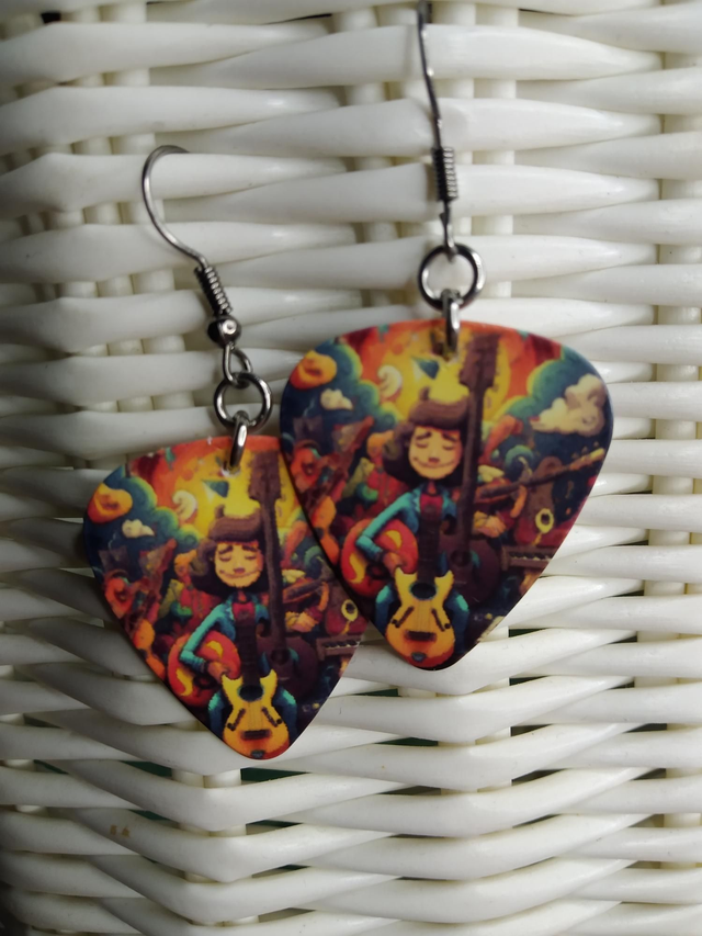 Boucles d&#039;oreilles médiators Homme