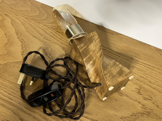 Room lamp made of mango wood and an Edison light bulb.