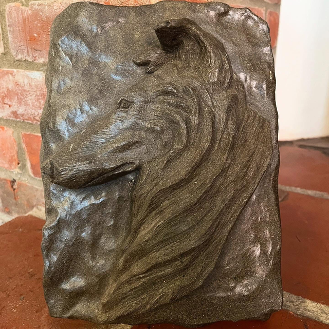 A Reconstituted Stone Relief Wall Plaque In The Form Of A Collie Dog