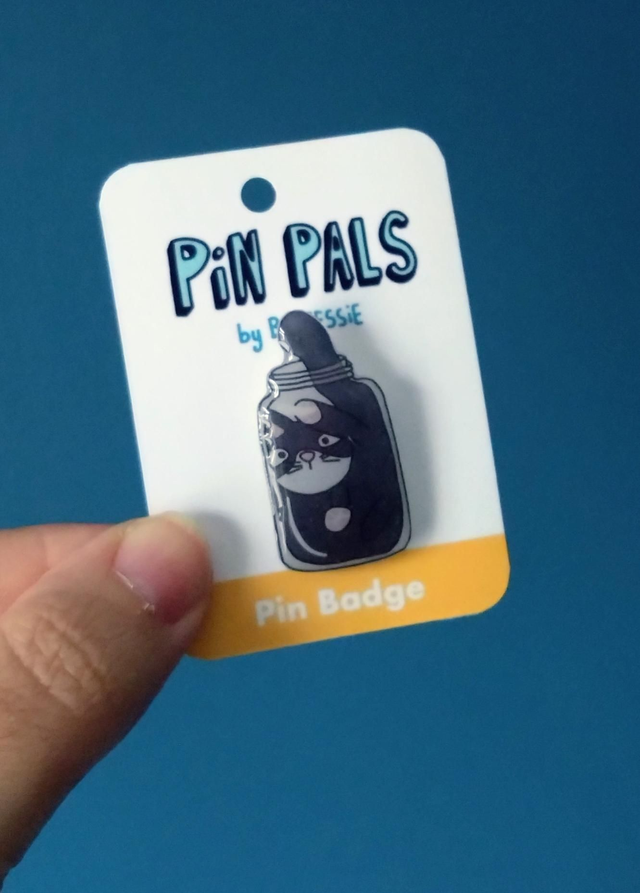 Cat in a jar pin badge