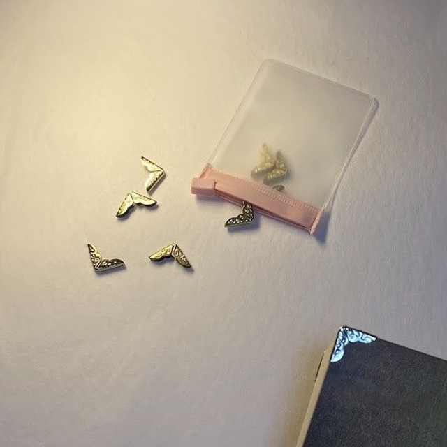 Protecteur coin de livre x8