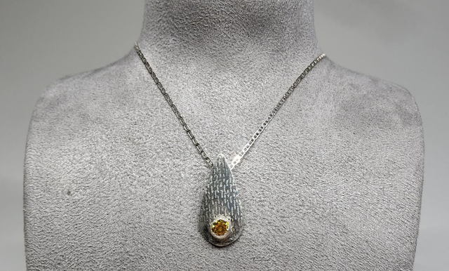 Teardrop with citerine cubic zirconia fine silver pendant