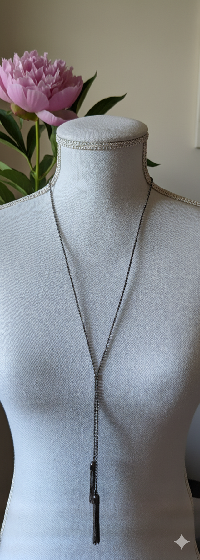 Sautoir strass et pompon 