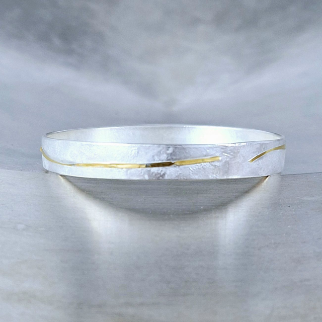 Armreif Silber mit Gold 900/- aufgeschweißt