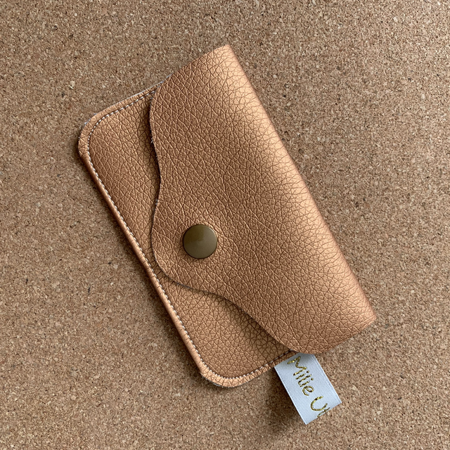 Porte monnaie en similicuir.