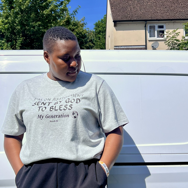 Grace Stone – “On Assignment” Faith T-Shirt (Unisex, Heather Grey)