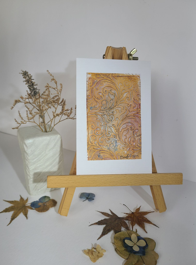 Carte aux motifs d'arabesques végétales