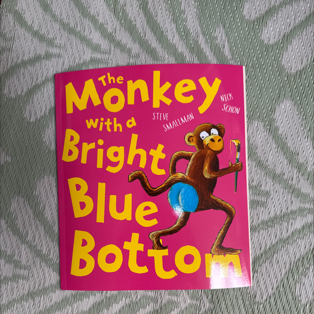 The monkey with a bright blue bottom 
