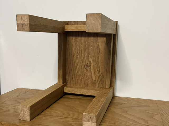 Two rustic low stools made of American Oak.