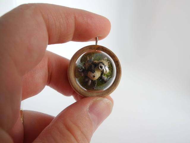 Tanuki sleeping after getting drunk - miniature pendant for fans of Japanese mythology