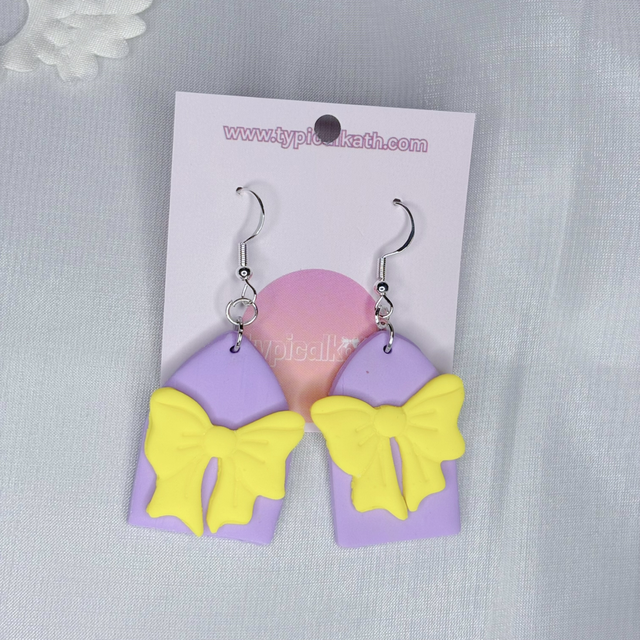 Cute bow clays earrings 