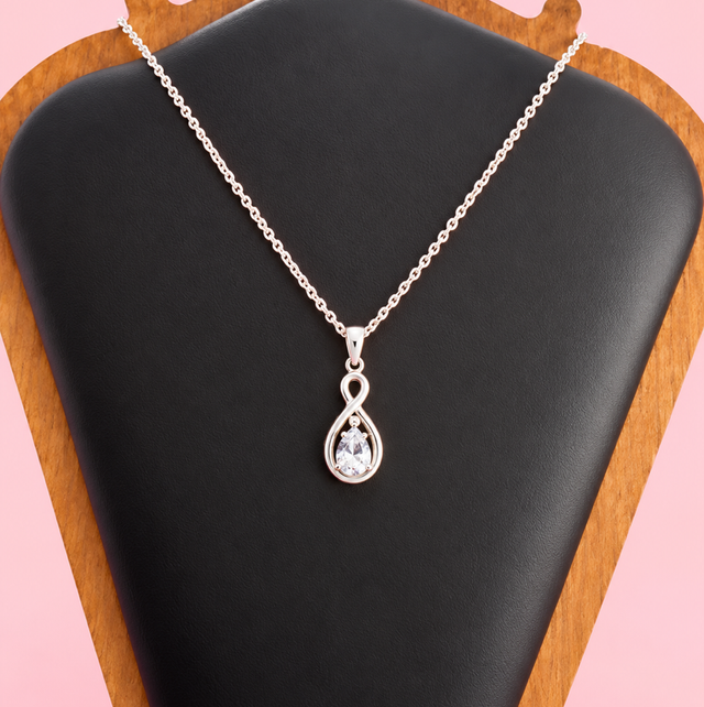 Sterling Silver &amp; Blue Topaz Pendant With Belcher Chain