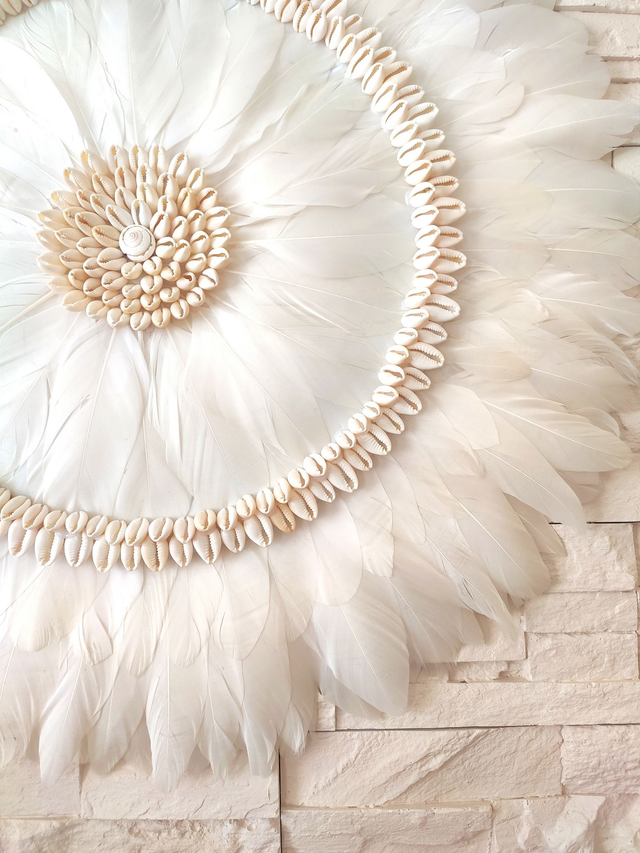 Jujuhat plumes blanches et coquillages