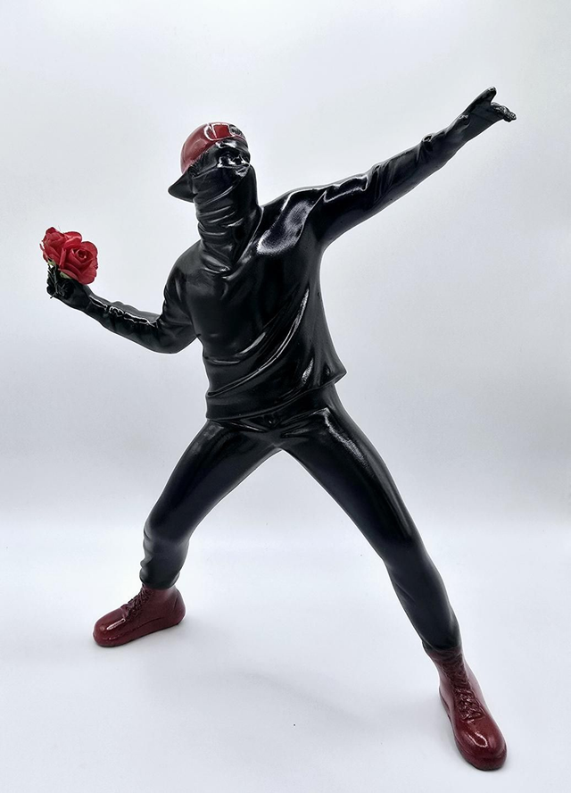 576. Banksy inspired 'Flower Thrower' 
