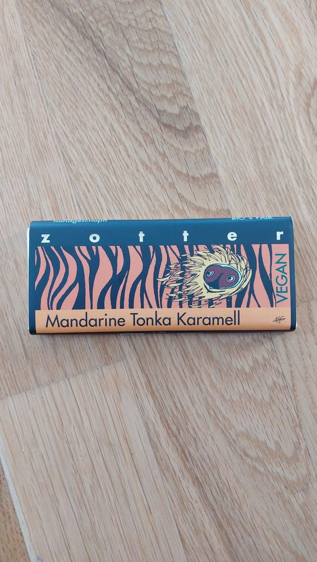 Zotter Tangerine marzipan & tonka bean caramel filled vegan handscooped bar