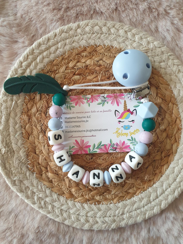 Attache tétine Plume