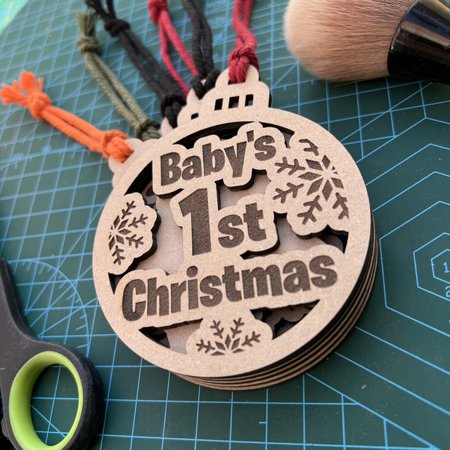 Wooden laser cut and hand finished “Baby&#039;s 1st Christmas” Bauble