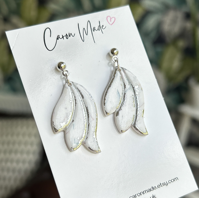 White and silver floral shape with ball stud 