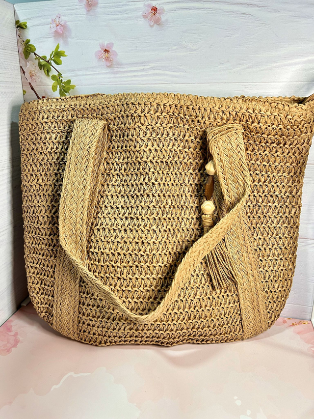 Bolso de paja de borlas