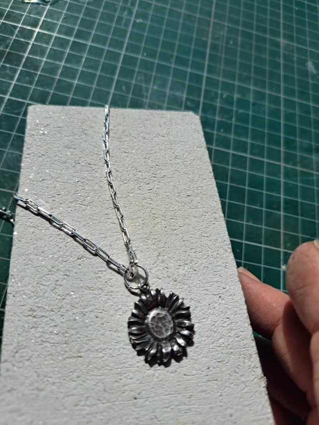 Silver sunflower pendant 