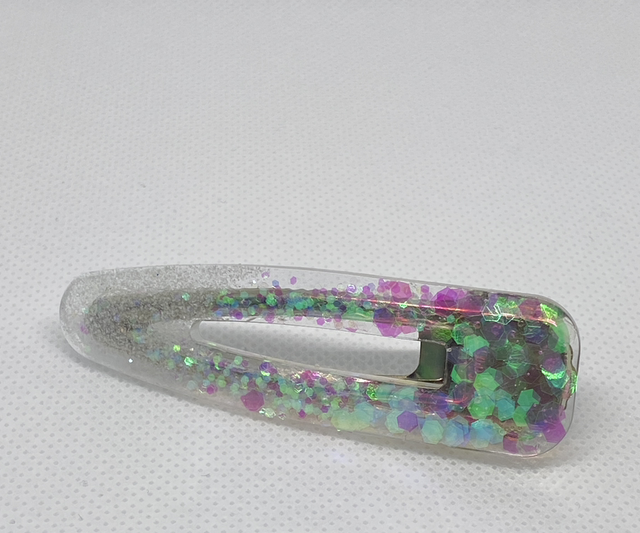 Clear hair slide with iridescent glitter  