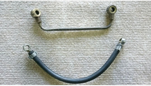 Petrol oil feed pipe. Rubber hose