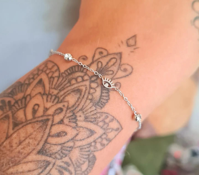 Bracelet en acier inoxydable + oeil et strass