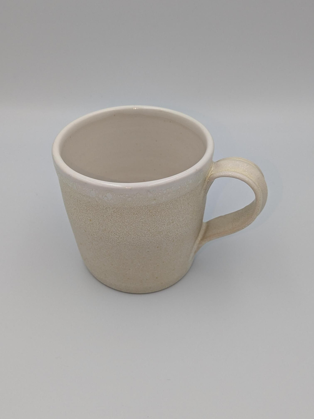 Cream and white mug