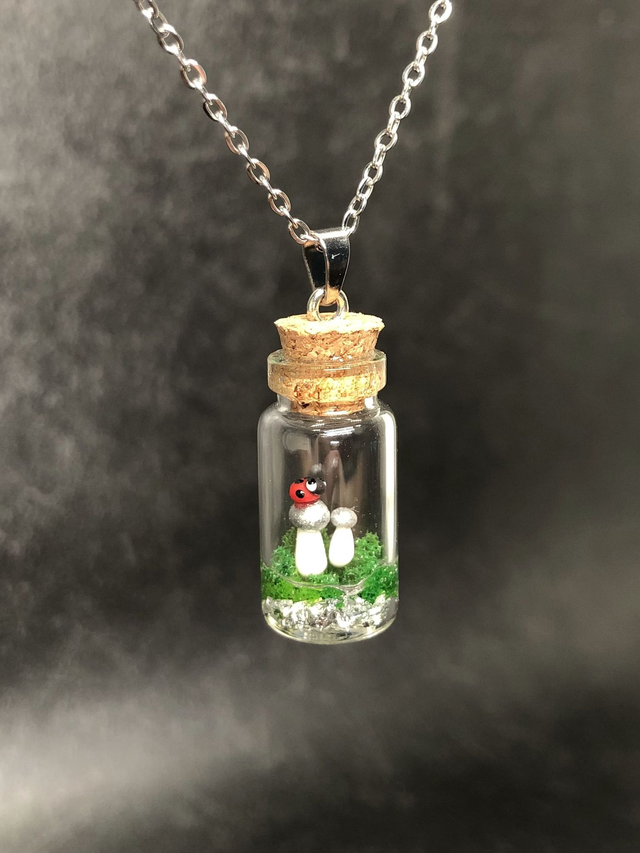 Pendentif cèpe argenté