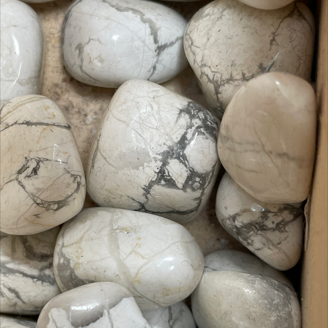 Magnesite, a member of Calcite Group tumbled stone