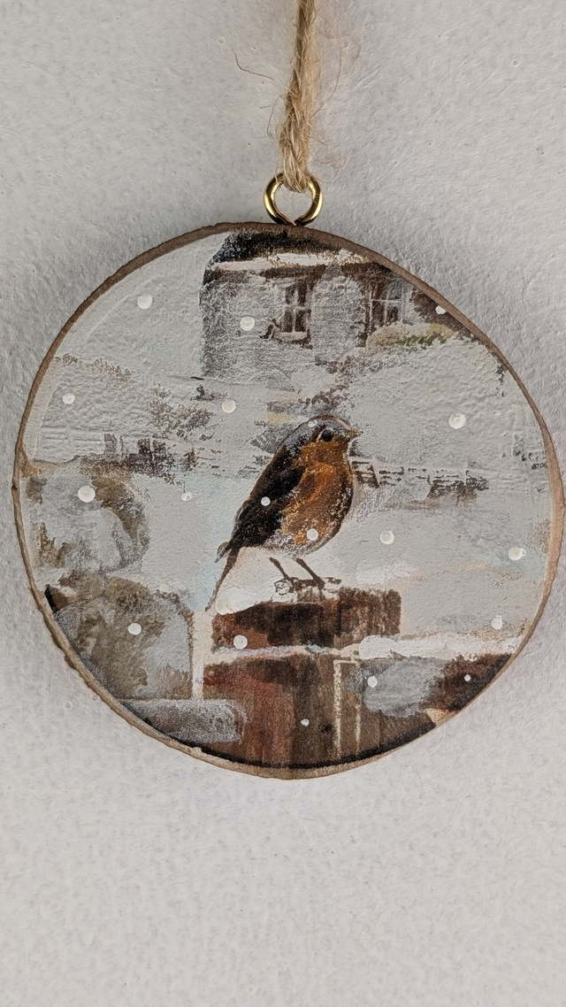 Robin on fence post, infront of building - Log slice