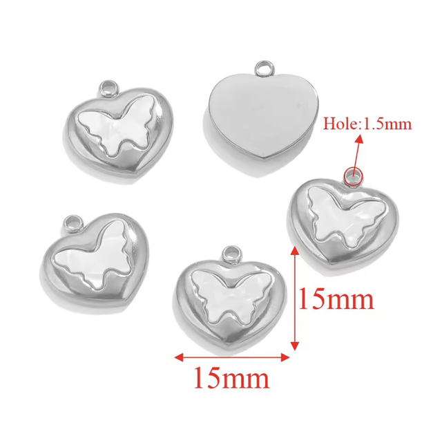 Charm effetto madreperla cuoricino con farfalla 