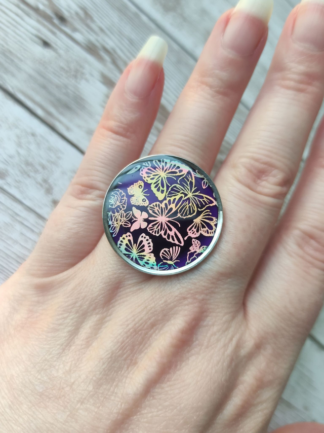 Bague acier &quot;Envolée de papillons&quot; réglable 