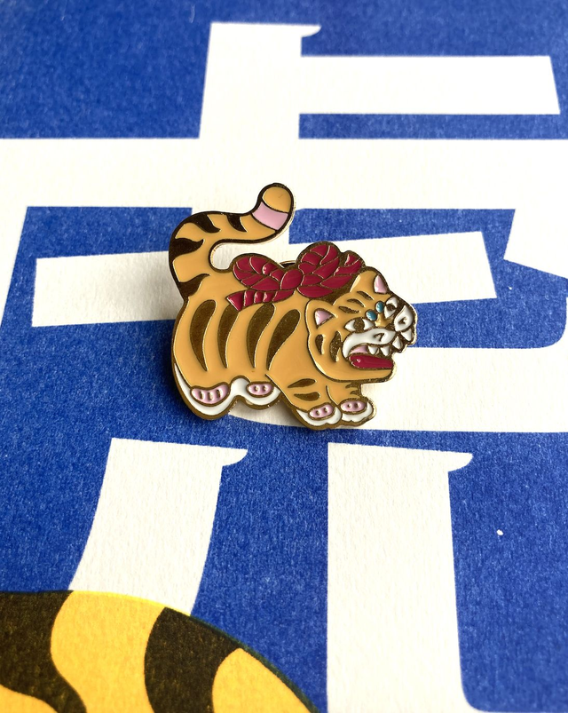Pin's mini tora