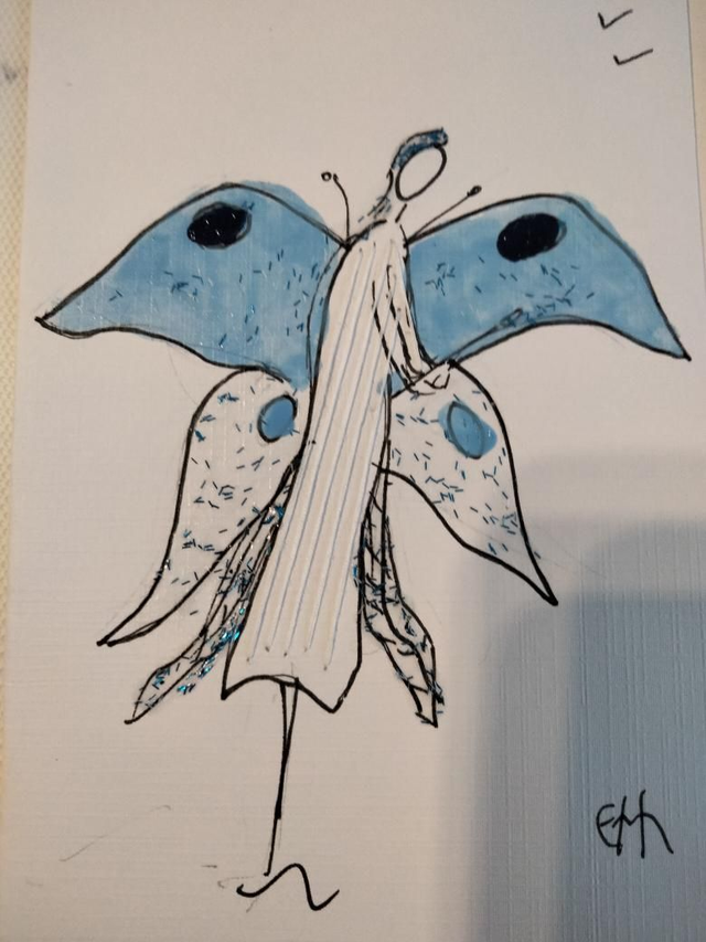 La fée et ses ailes papillon 