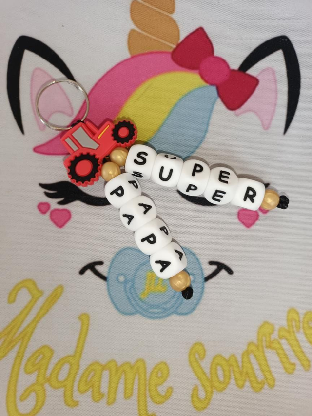 Porte clés 2 branches liées Tracteur 