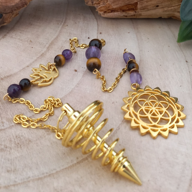 Pendule spirale en Cuivre doré