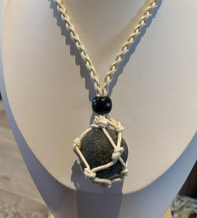 Adjustable necklace containing olive sea glass