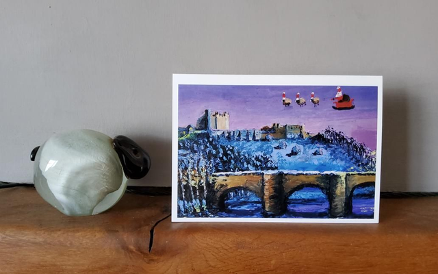 Father Christmas and his flying sheep over Richmond Castle. A6 christmas card. 