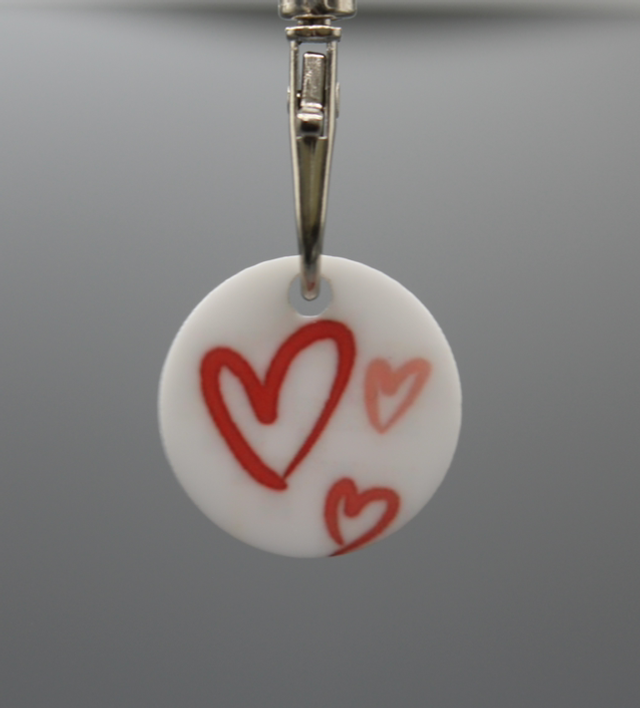 Heart trio trolley token