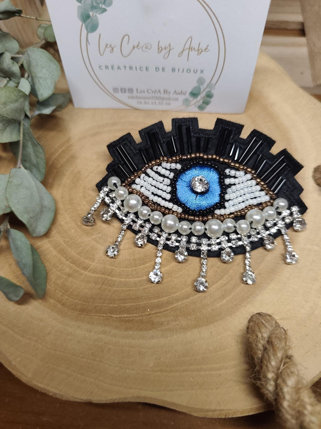 BIG BROCHE OEIL PERLES/STRASS 0001352