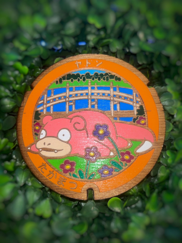 Plaque pokémon Ramoloss allongé.