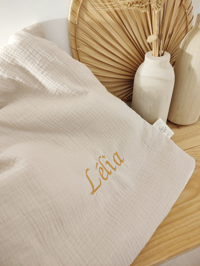 Couverture polaire avec broderie