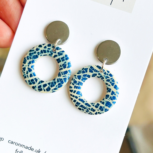 Blue shiny donut shape earrings with stainless steel stud