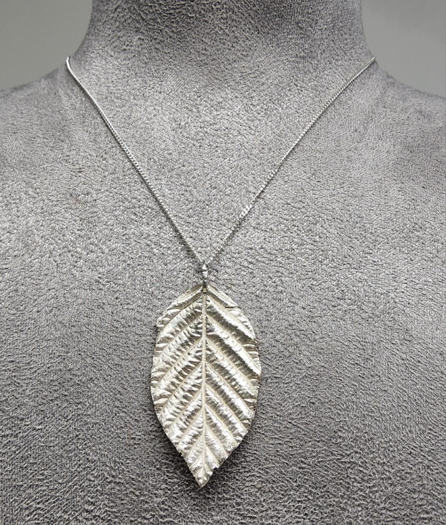Hornbeam leaf pendant on silver necklace