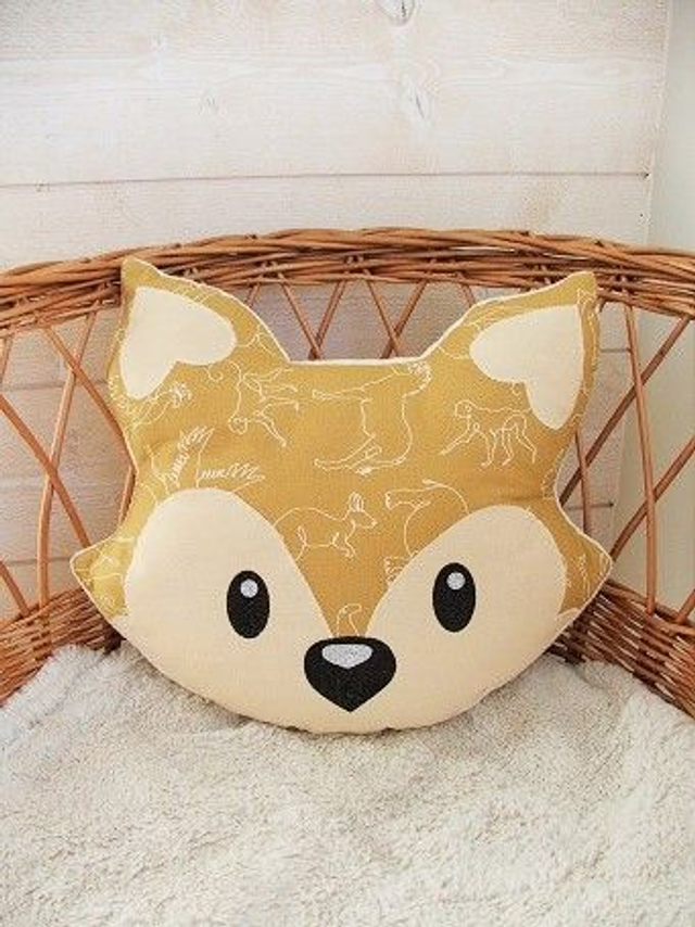 Coussin range pyjama savane