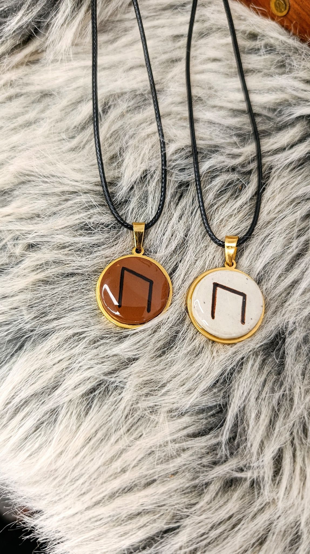 RÖNA - Pendentif acier inox doré