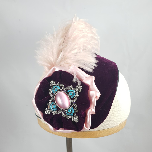 Fascinator bandeau à cocarde et plume d&#039;autruche